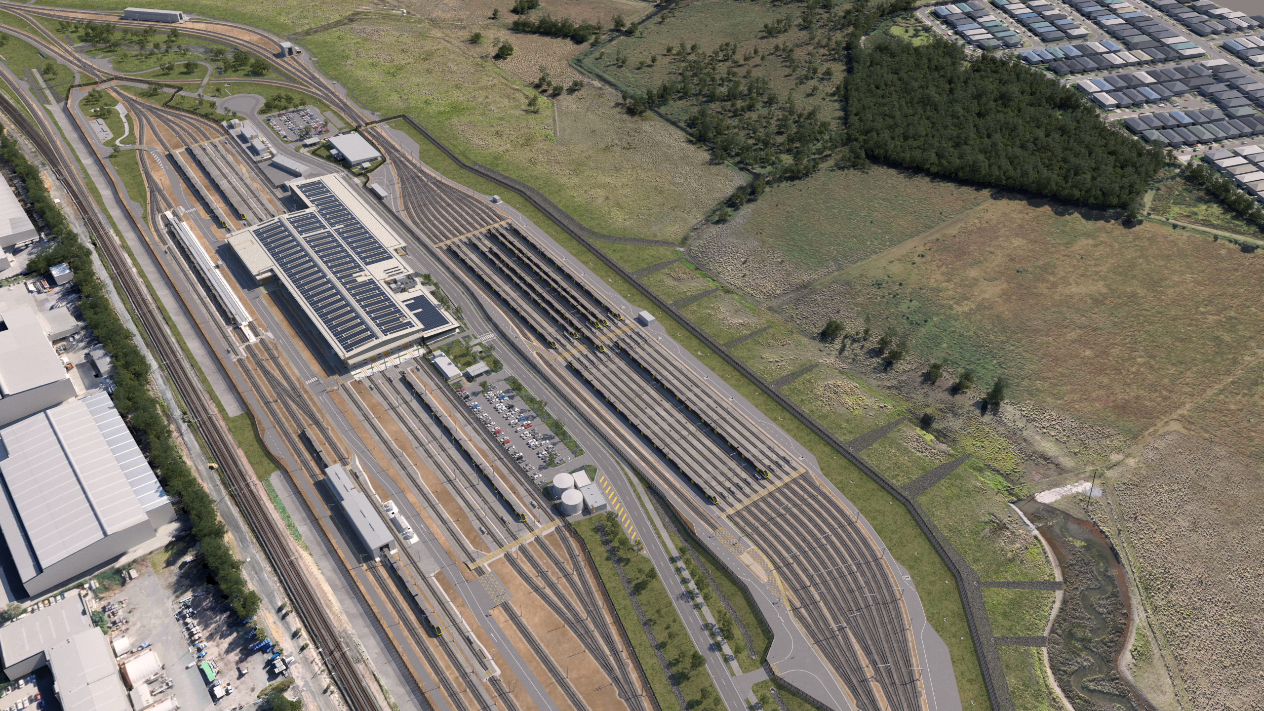 Artist impression aerial view rail facility site, including connections to Gold Coast main line, train wash facility, QR staff facilities, maintenance facility main building, administration office, Goldmine Road access and train stabling yard.